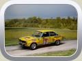 Ascona A Rallyeversion 1975 Bild 1a
Hersteller: Schuco (02675)
gelb mit blau 1.500 mal 02/09
Zum Original:
Rallyeversion von Elba, Fahrer Röhrl / Berger.